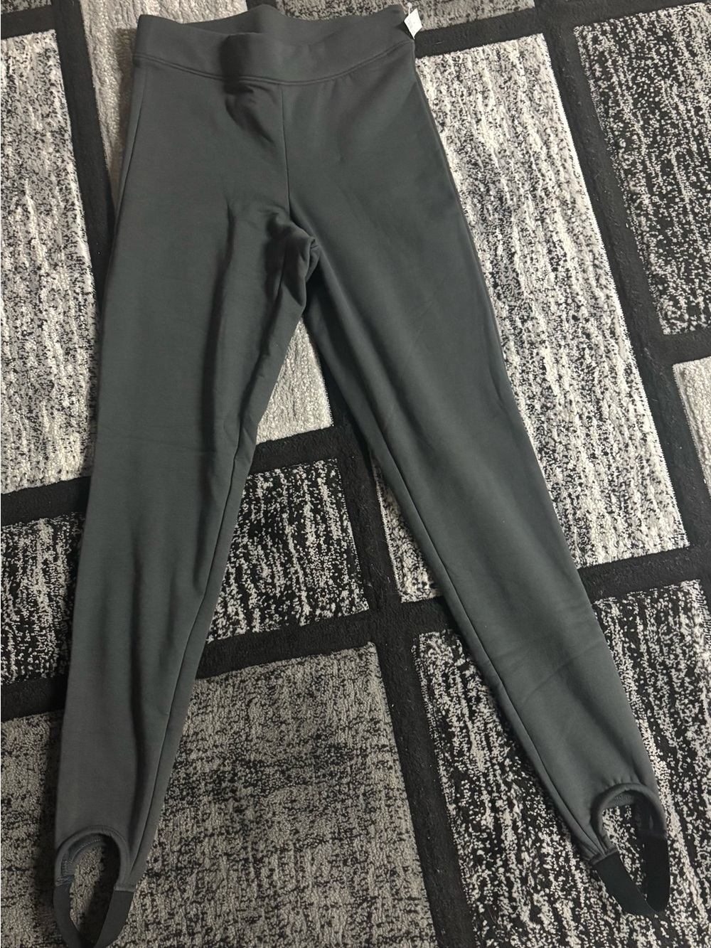 Stirrup pants. Never worn. Dark gray. Size small.